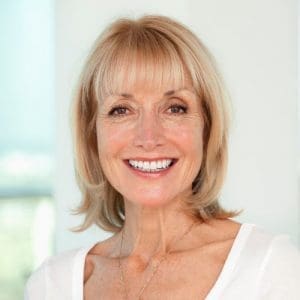 beautiful older woman happy about her vision after Cataract Surgery