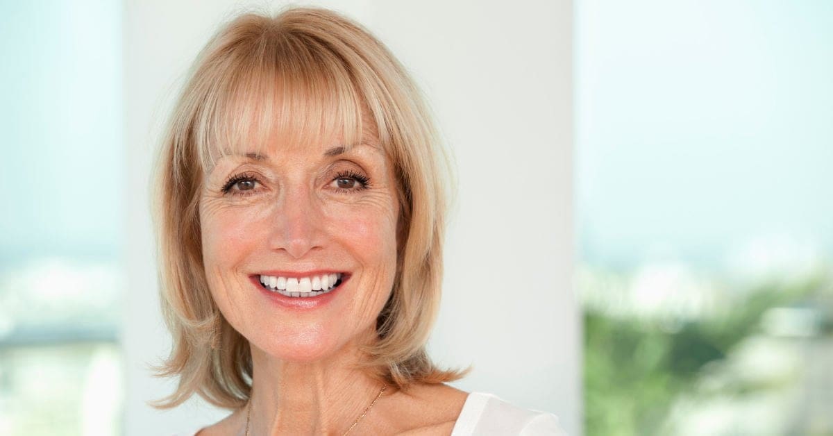 beautiful older woman happy about her vision after Cataract Surgery